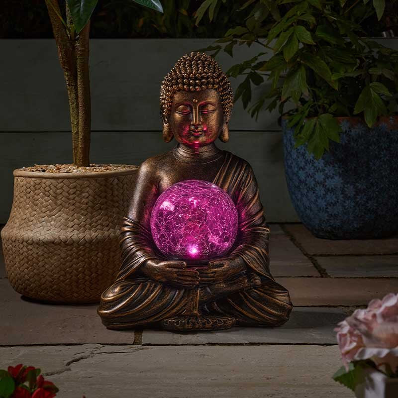 Bouddha solaire avec boule de cristal lumineuse